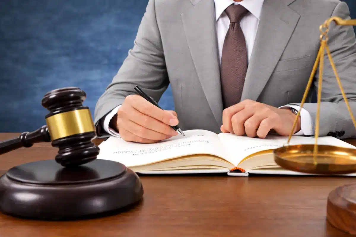 A lawyer signing documents